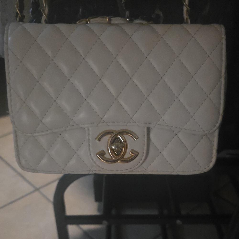 CHANEL Mini Quilted Lambskin Flap Bag in Light Gray with Gold Hardware